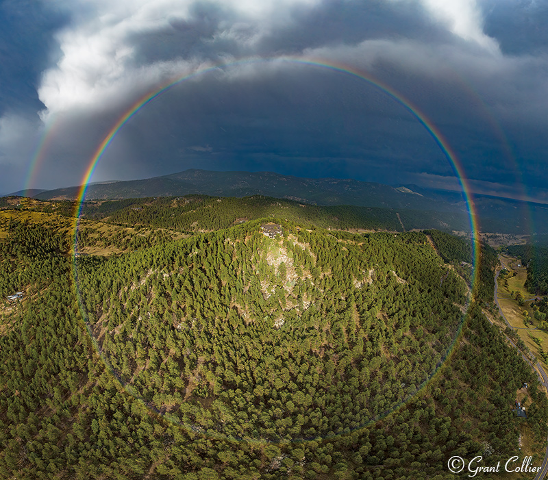 Full circle rainbow over Evergreen